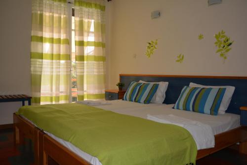Dimitra Hotel客房内的一张或多张床位