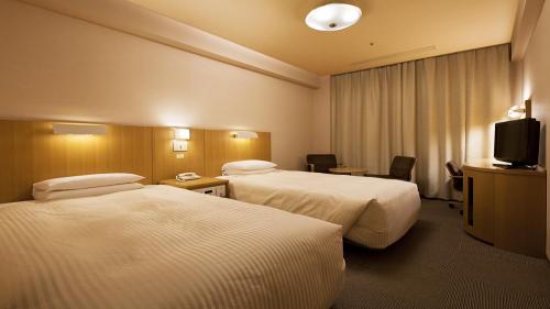 Hotel Grand Hill Ichigaya客房内的一张或多张床位