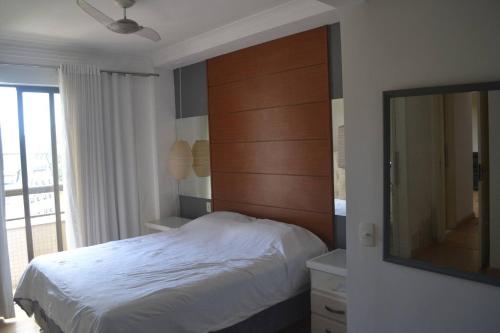 Apartamento Inteiro com Vista do Lago Quitandinha客房内的一张或多张床位