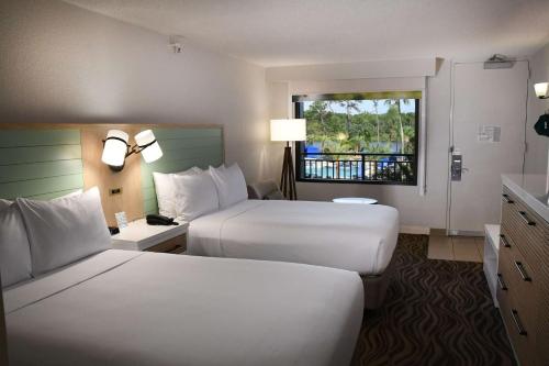 布纳维斯塔湖迪士尼斯普林®度假区温德姆花园酒店客房内的一张或多张床位