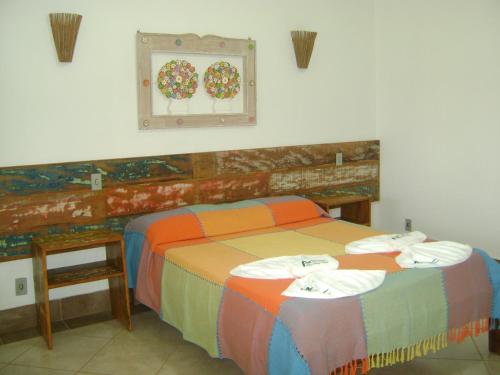 Pousada Serra Azul客房内的一张或多张床位
