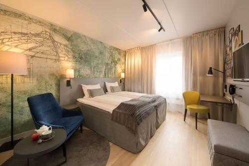 斯堪哈马尔酒店客房内的一张或多张床位