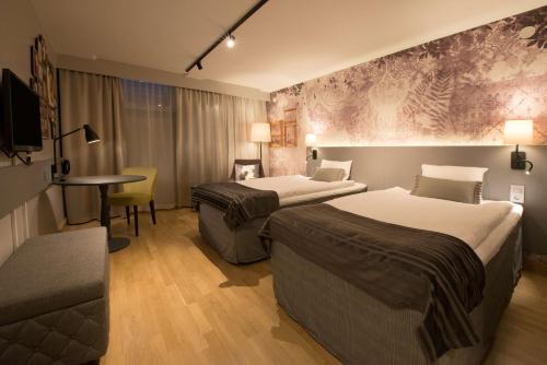 斯堪迪克温恩酒店客房内的一张或多张床位