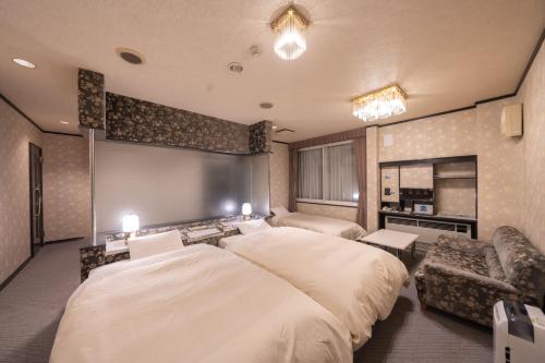 旭川自由宿酒店客房内的一张或多张床位