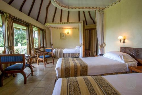 Arusha Serena Hotel客房内的一张或多张床位