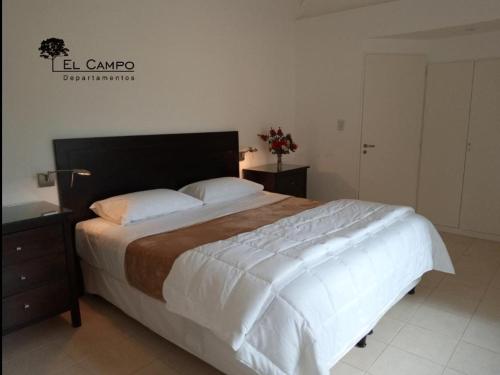 El Campo Departamentos客房内的一张或多张床位