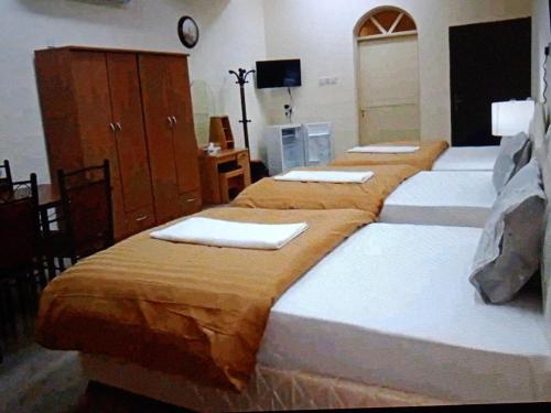 Ahlam Musandam Villa客房内的一张或多张床位
