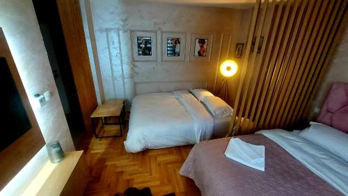 Apartman Planinski Kutak客房内的一张或多张床位