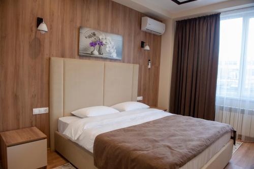 Lotus Hotel Chisinau客房内的一张或多张床位