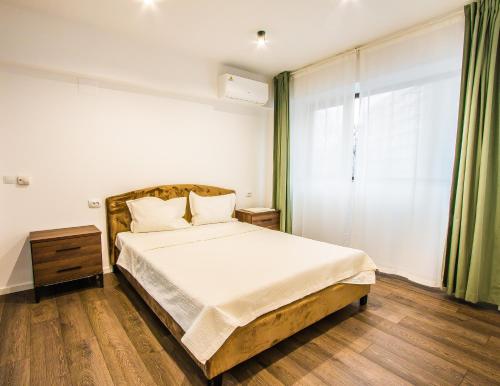 Iancului ApartHotel客房内的一张或多张床位