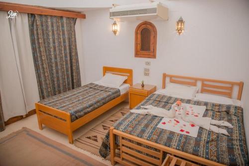 Lagona Dahab Hotel客房内的一张或多张床位