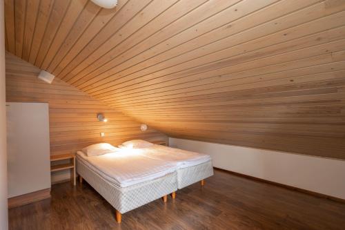 Ski-Inn MastonAitio客房内的一张或多张床位