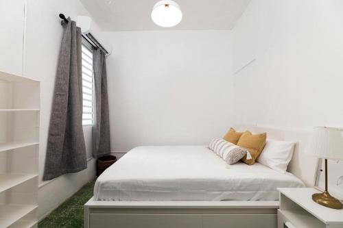 Digital Nomad San Agustin Apartments客房内的一张或多张床位