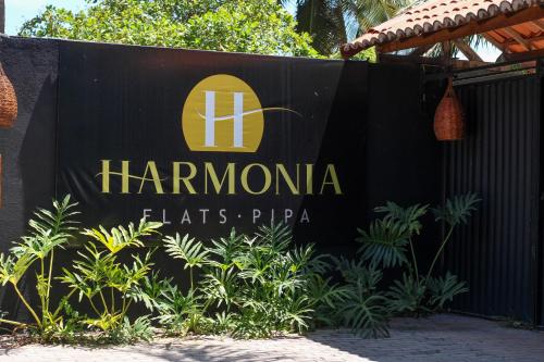 皮帕Harmonia Flats的天体酒店标志
