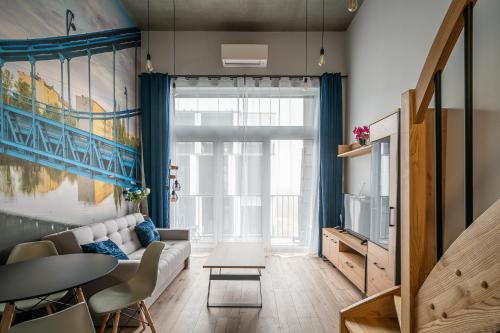 RentPlanet - Apartamenty Zarembowicza II的休息区