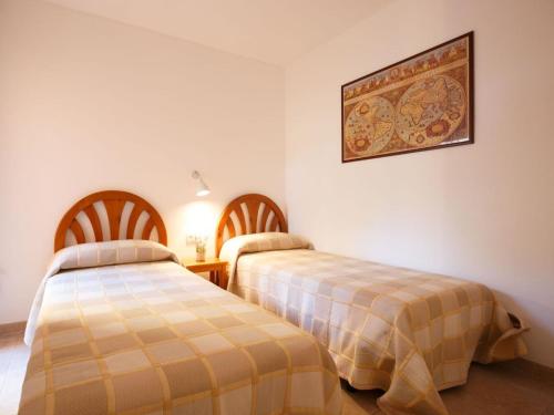 Apartment Sa Guilla 3 dorm by Interhome客房内的一张或多张床位