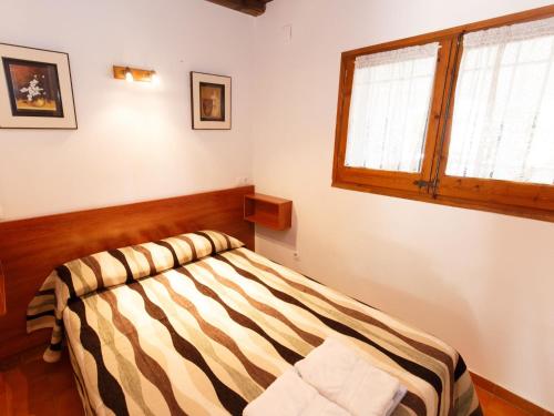 Holiday Home Calsina Baix by Interhome客房内的一张或多张床位