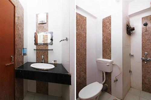 塔拉皮斯MADHU MAMATA HOTEL的一间带卫生间和水槽的浴室
