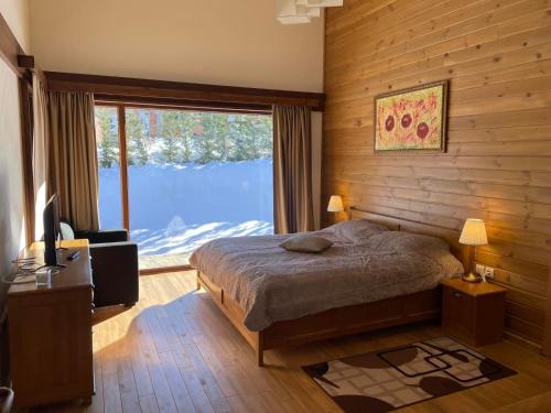Villa Naya, Pirin Golf & Spa客房内的一张或多张床位