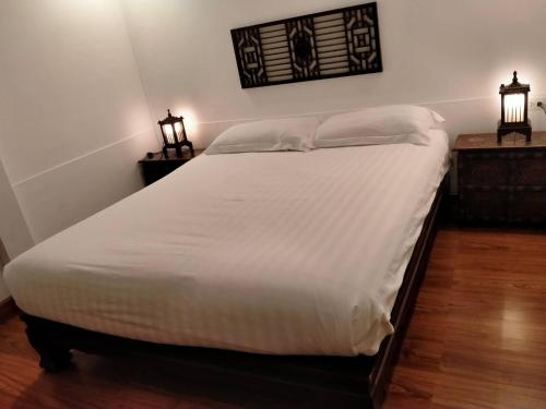 BTC Hua Hin Home managed by BTC Boutique Resort客房内的一张或多张床位
