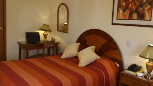 Copacabana Hotel客房内的一张或多张床位