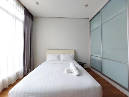 Soho Suites KLCC By iRent365客房内的一张或多张床位