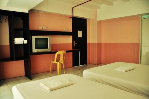 拉普拉普城市GV酒店 客房内的一张或多张床位