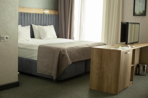 Home Suites Baku-Halal Hotel客房内的一张或多张床位