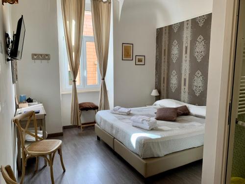 Guest House Casa Vicenza客房内的一张或多张床位
