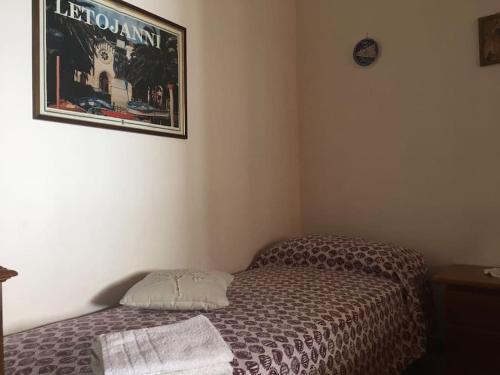 Appartamento Sul Lungomare客房内的一张或多张床位