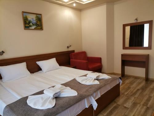 HOTEL PARIS Spa area客房内的一张或多张床位
