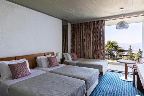 德尔福阿玛利亚酒店客房内的一张或多张床位