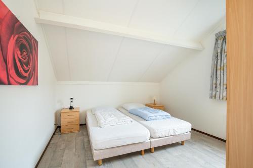 Hello Zeeland - Vakantiehuis Schelde 194客房内的一张或多张床位