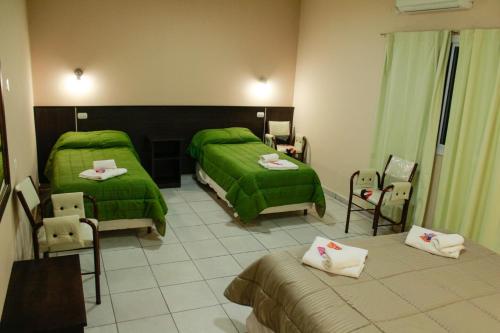 Hotel Cuesta de Miranda II客房内的一张或多张床位