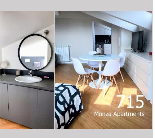 蒙扎Monza Apartments的客房设有桌子、镜子和浴室