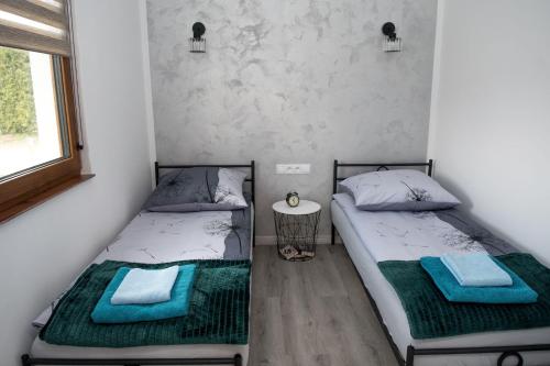 Natalia Rest domki & camp客房内的一张或多张床位