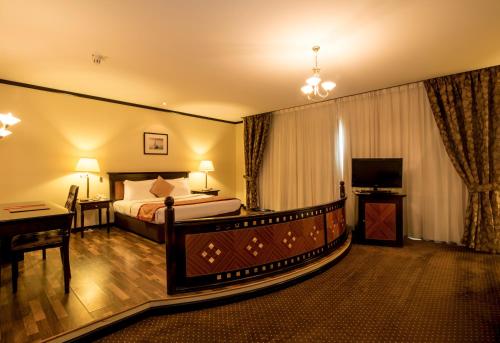 Rolla Suites Hotel -Former J5 Bur Dubai Hotel客房内的一张或多张床位