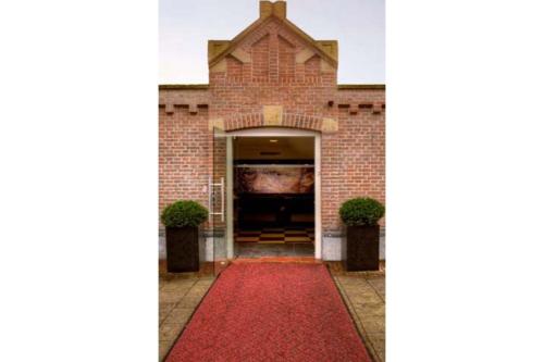 阿姆斯特丹Hotel Van Gogh的红地毯入口,带红地毯的建筑