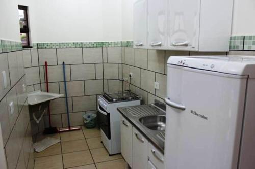 Bonito Residencial Flat的厨房或小厨房