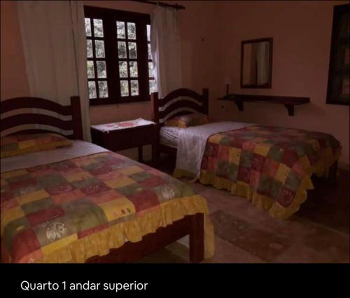 Sítio São Gerardo - Aconchegante casa no campo.客房内的一张或多张床位