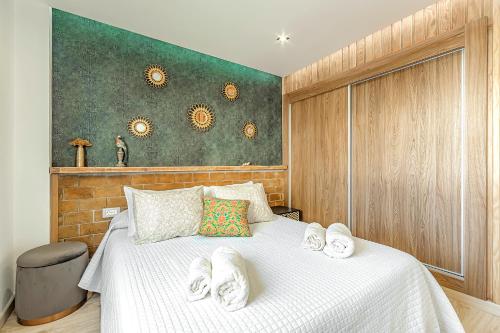 Luxury 3 bedroom Perla Del Mar客房内的一张或多张床位