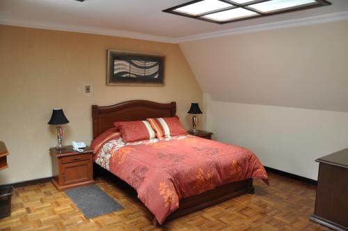 苏克雷帕特里莫尼奥旅馆客房内的一张或多张床位