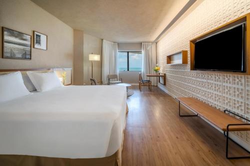 累西腓博阿维亚任美居酒店客房内的一张或多张床位