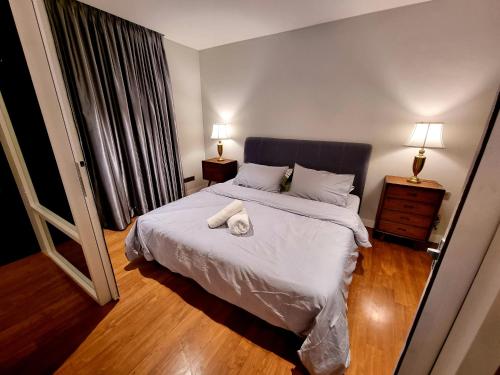 Anggun Luxury Suite客房内的一张或多张床位
