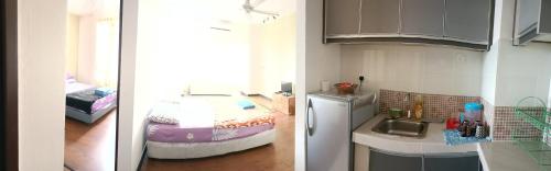 哥打巴鲁Caliph Suite Apartment Homestay Anjung Vista Kubang Kerian的带水槽和冰箱的厨房的两张图片