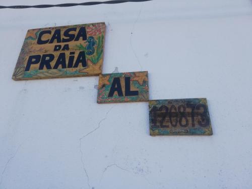 Casa da Praia Alfarim的证书、奖牌、标识或其他文件