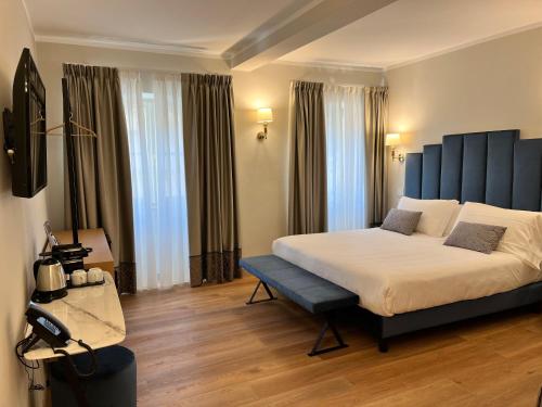 Corte dei Sogni Boutique Hotel & spa客房内的一张或多张床位