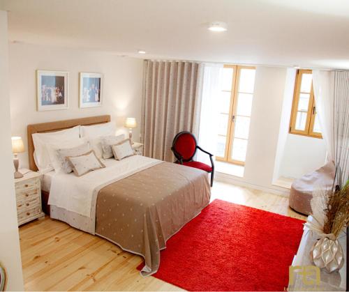 TM Luxury Apartments Lisbon客房内的一张或多张床位