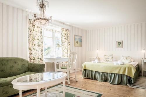 Hotell Klockargården客房内的一张或多张床位