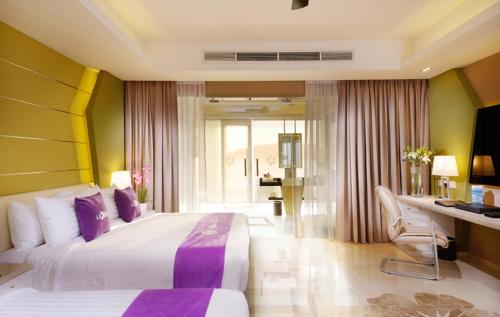 马来西亚大红花（丽昇精选酒店）客房内的一张或多张床位